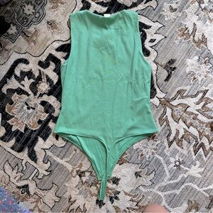 Green House of Harlow bodysuit